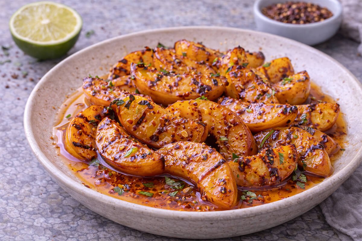 Grilled Peaches with Aleppo–Tequila Honey Sauce