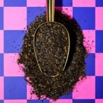 Ground dried lime loomi texture close up – tangy Middle Eastern spice